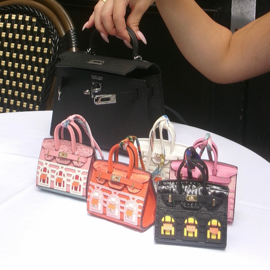 Elegant Birkin-inspired bag charm featuring iconic Faubourg design, perfect for bag decoration